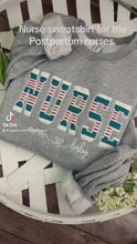 Load and play video in Gallery viewer, Nurse sweatshirt from baby hospital swaddle Blanket-  RN labor delivery  Licensed Practical, CNA,  - Fabric Keepsake Sweatshirts - Applique