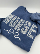 Load image into Gallery viewer, Coquette Nurse Sweatshirt – Appliqué &amp; Embroidered Bow | Custom Department Option. Labor and delivery. Emergency, NICU, Mother Baby, doctor
