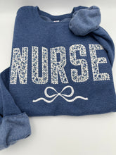 Load image into Gallery viewer, Coquette Nurse Sweatshirt – Appliqué &amp; Embroidered Bow | Custom Department Option. Labor and delivery. Emergency, NICU, Mother Baby, doctor
