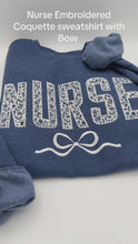 Load and play video in Gallery viewer, Coquette Nurse Sweatshirt – Appliqué &amp; Embroidered Bow | Custom Department Option. Labor and delivery. Emergency, NICU, Mother Baby, doctor
