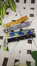 Load and play video in Gallery viewer, Cute Keychain Wristlet Key Fob - Paw Prints, Flowers, Butterflies
