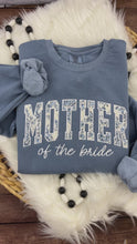 Load and play video in Gallery viewer, Mother of the Bride Floral Appliqué Shirt or Sweatshirt – Custom Wedding Apparel – Personalized Mother Wedding Outfit – Bridal Party Gift
